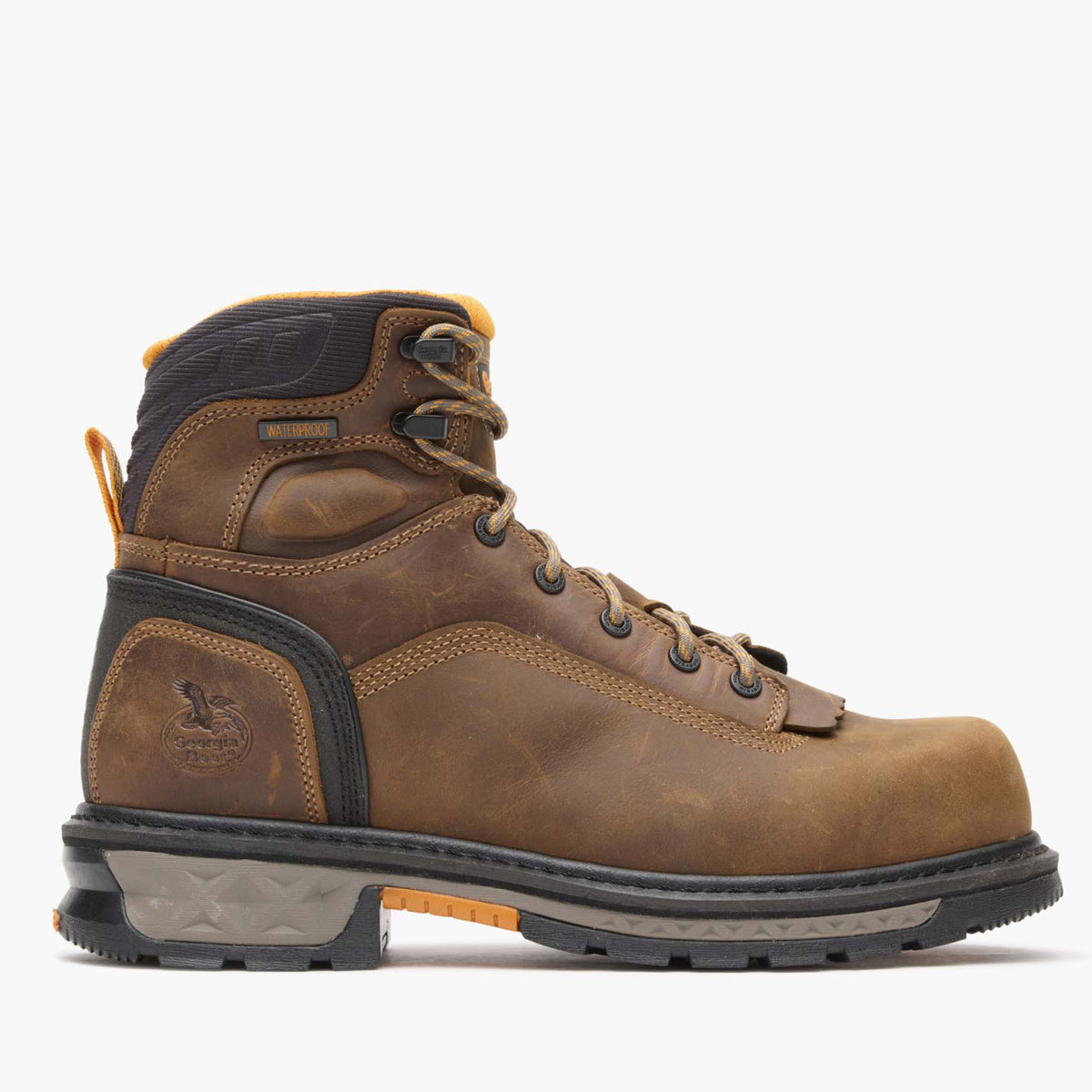 Brown leather boot with black sole on a white background