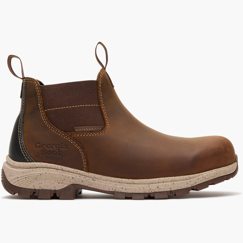Brown boot with beige sole on a white background